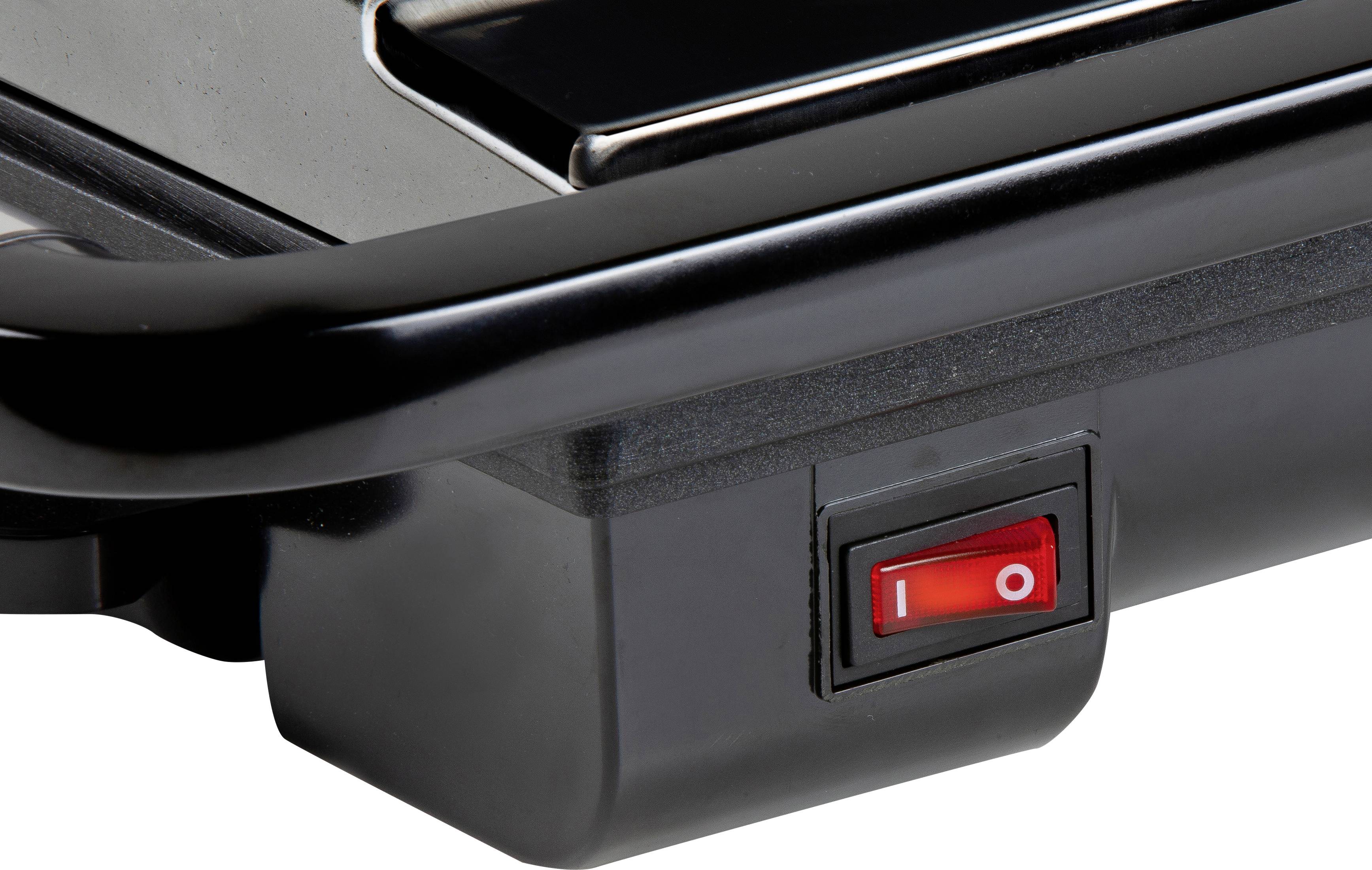A black, electric barbecue with a red power switch in close-up.