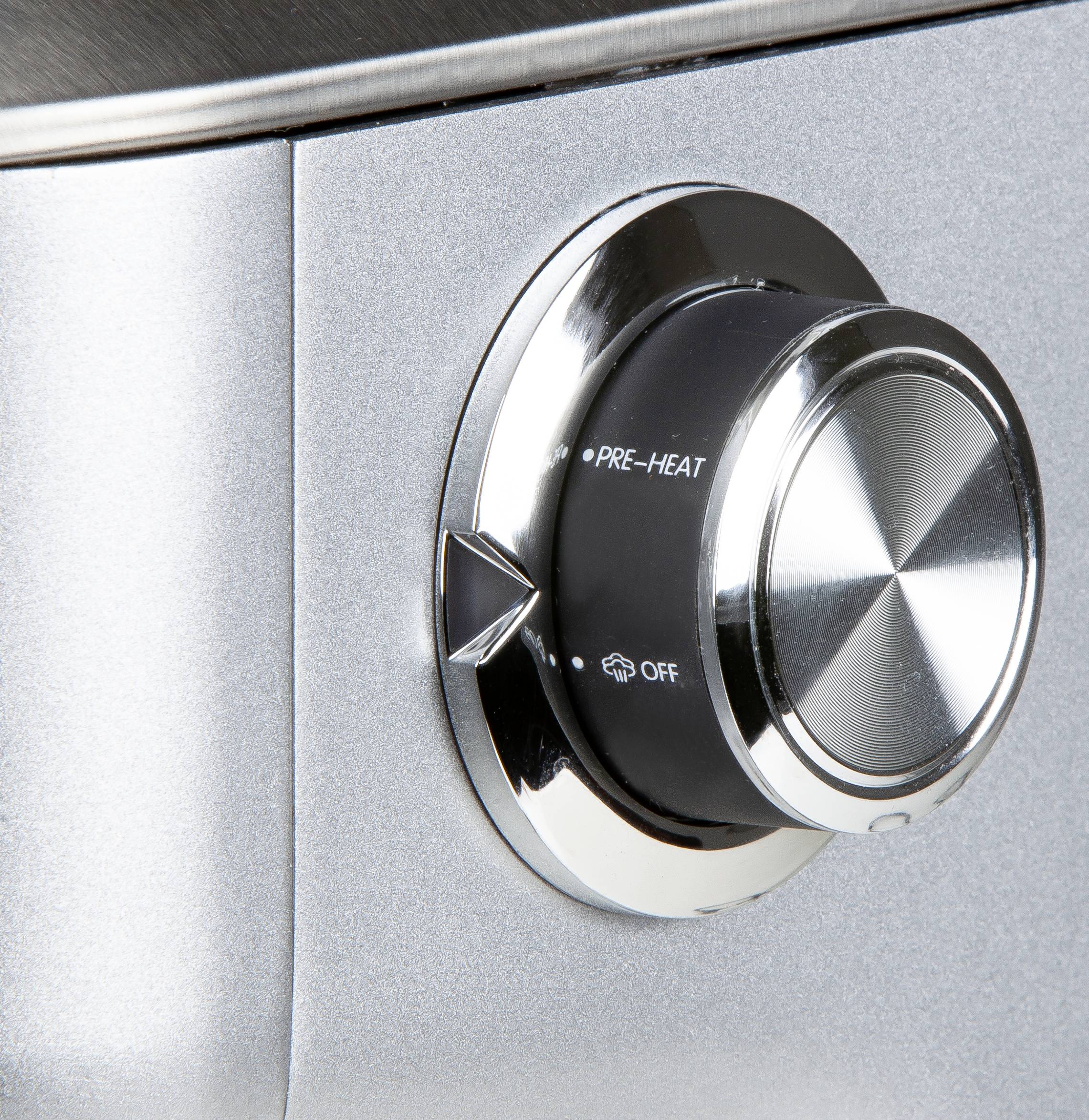 A silver rotary knob on a device with markings for 'OFF' and 'PRE-HEAT'. The knob is rotatable clockwise.