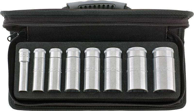 An open, black case with eight cylinders arranged in a row. The cylinders are silver and gleaming.