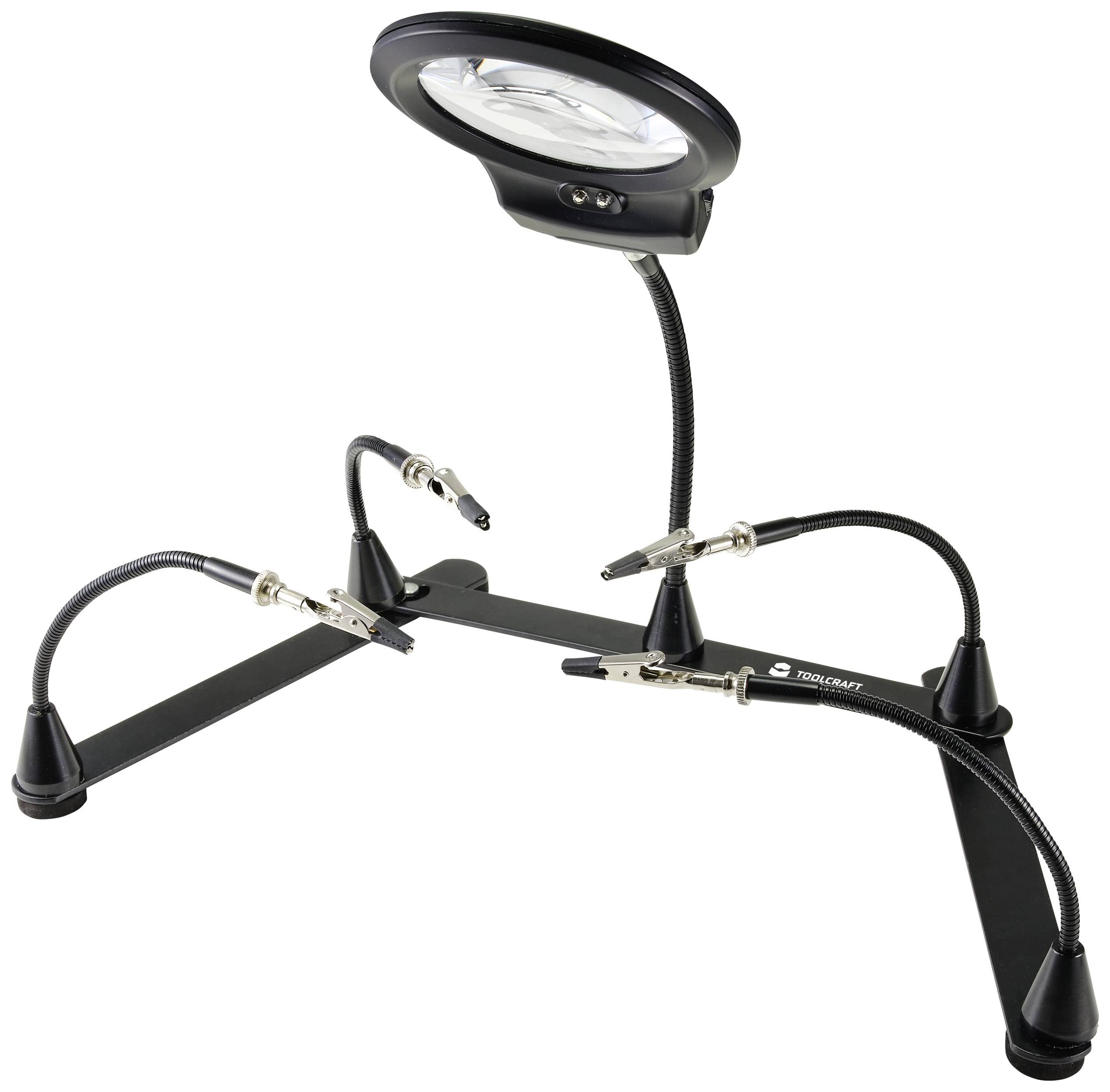 'Toolcraft' soldering station with flexible arm, magnifying glass, and crocodile clips. Suitable for precise electronic work under magnification.