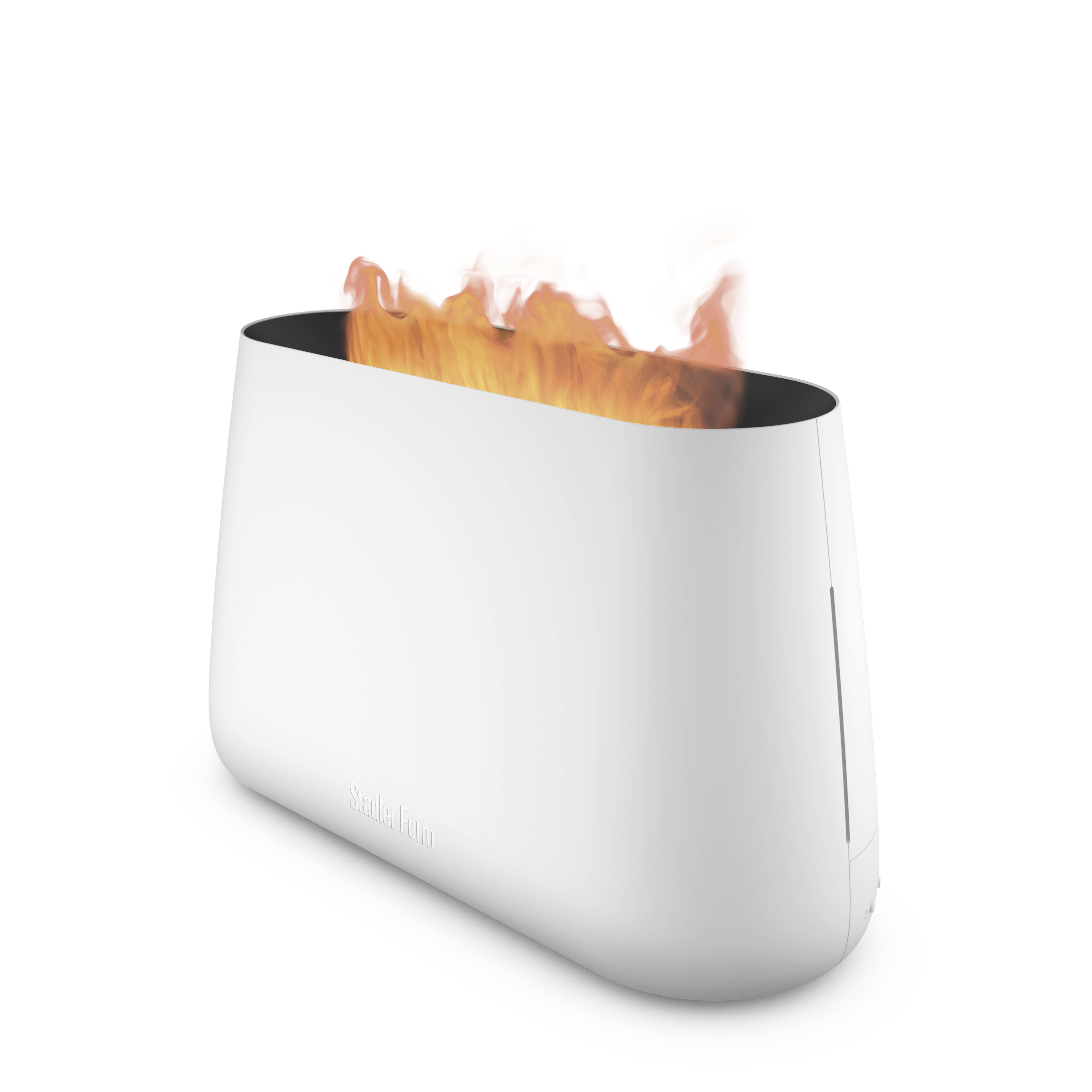 White porcelain vase with burning flames emerging from the opening. Modern, decorative indoor fireplace.