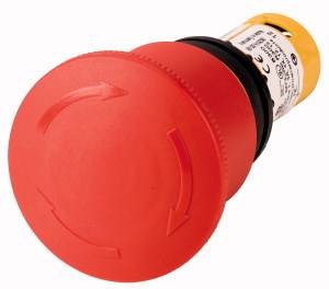 A large, red emergency stop switch with white arrows. The switch is designed for safety measures to immediately halt machinery.