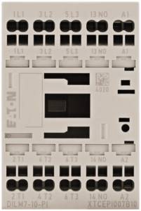 A white plastic component with multiple numbered terminal blocks, switch in the centre, marked with 'EATON'.