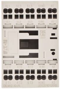 The image shows an electrical control unit with multiple numbered connections and a black central component.