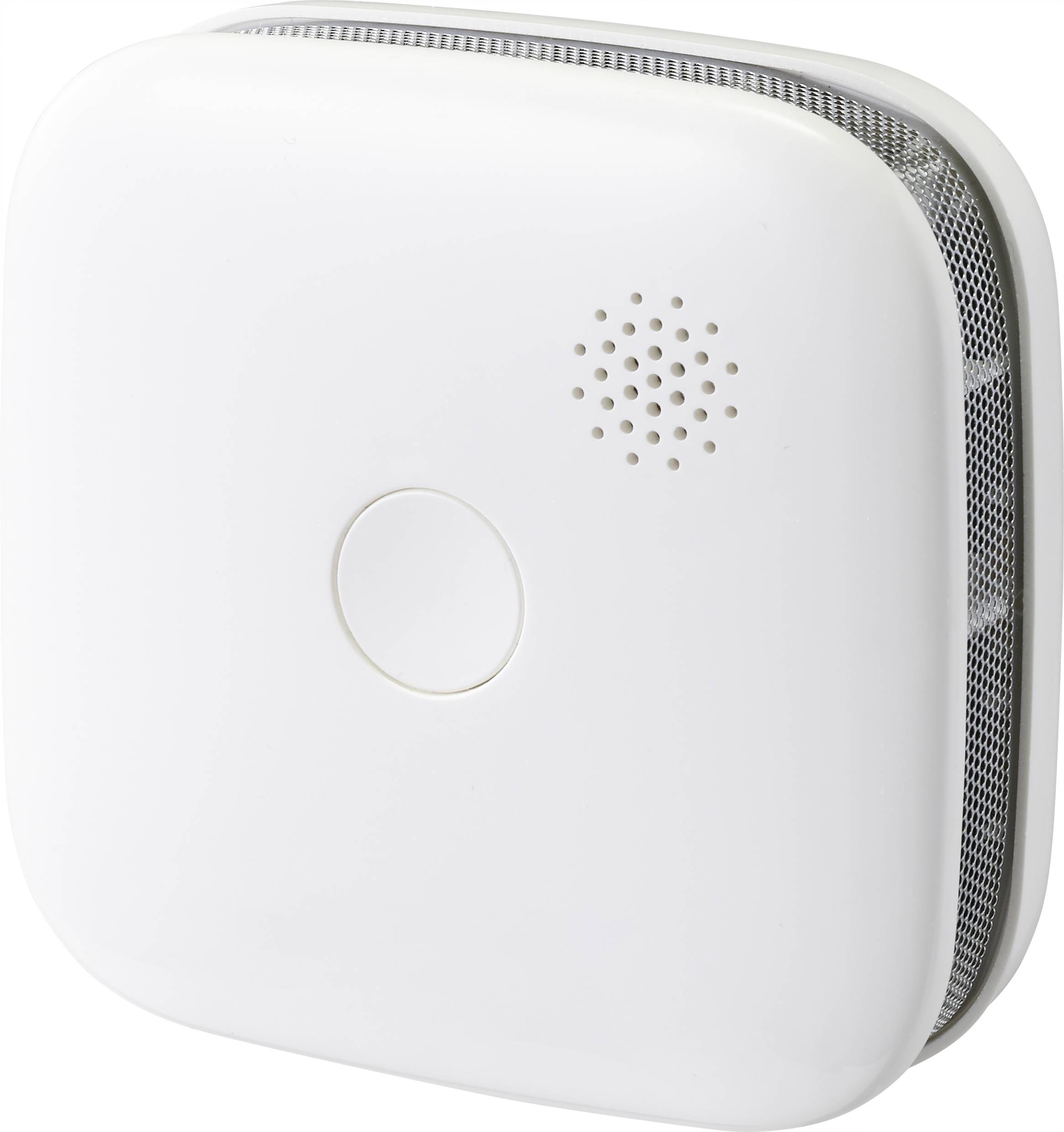 A square smoke detector with rounded corners and a central operating button mounted on a white wall.