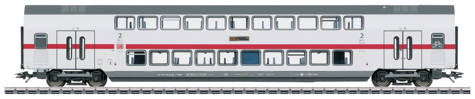 A double-decker passenger carriage of Deutsche Bahn with a grey body, red stripes and black wheels stands on railway tracks.