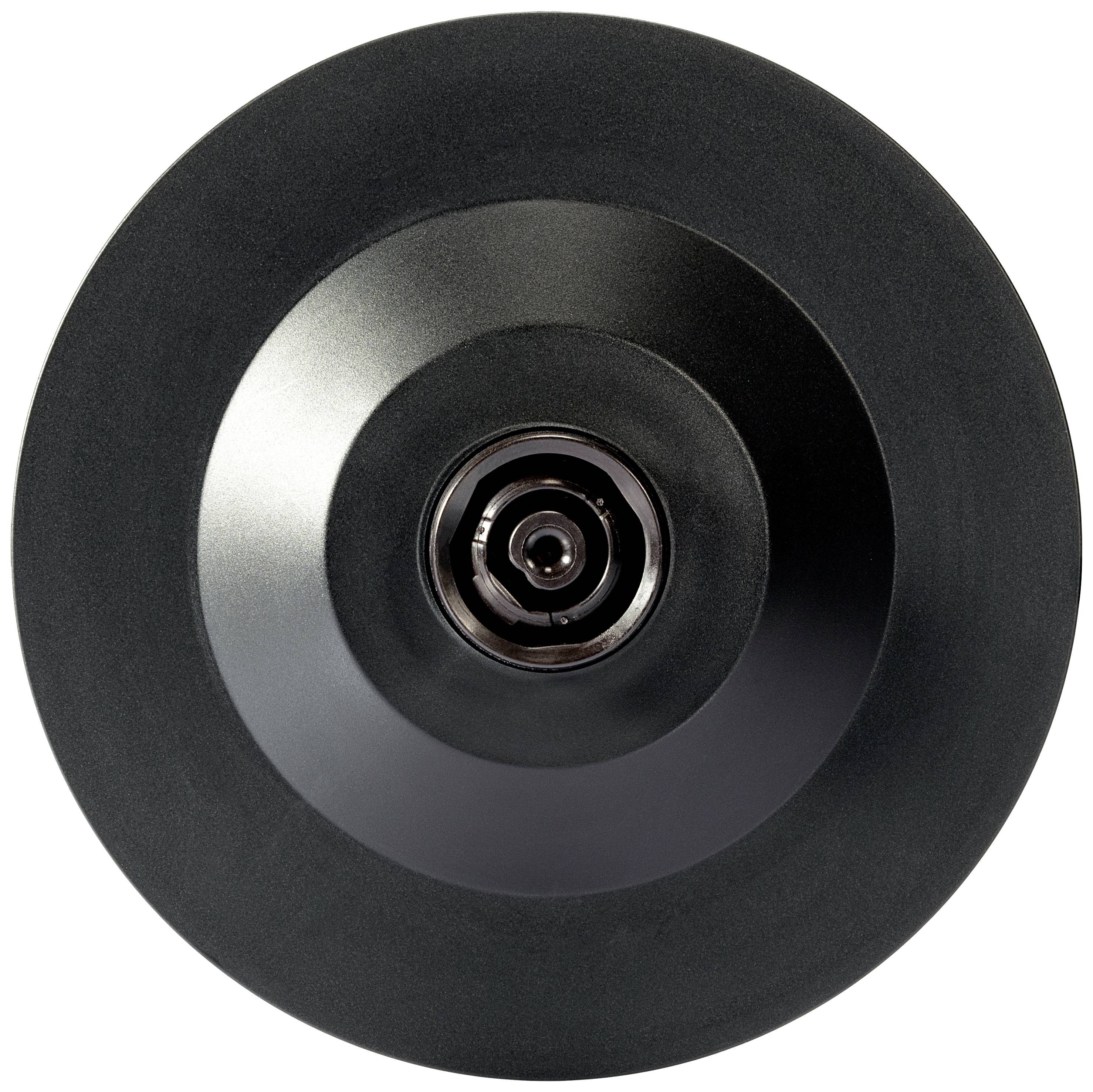 A black camera lens cap in close-up with a glossy surface.