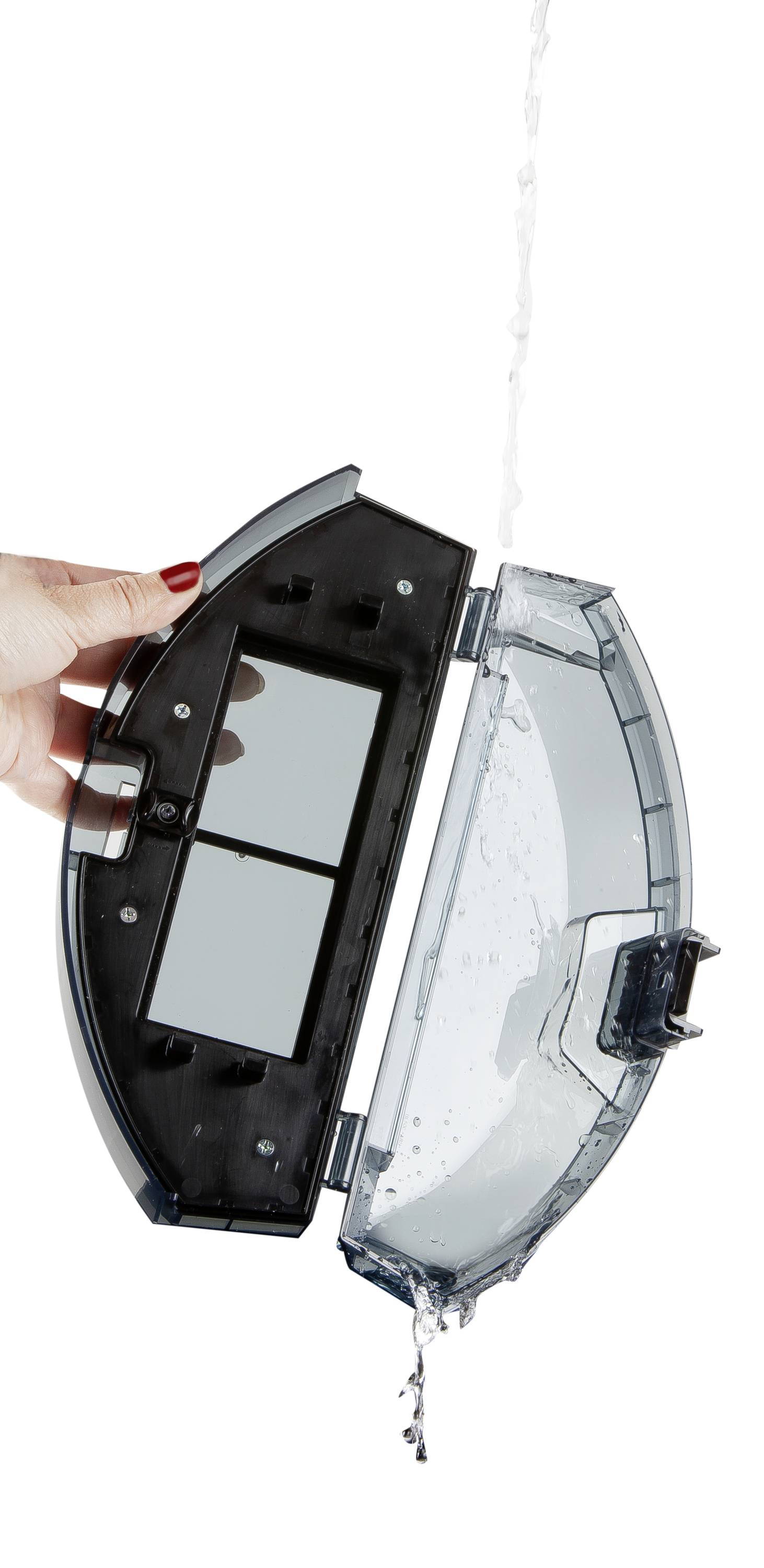 A hand is holding an open water tank of a robotic vacuum cleaner, with water flowing out of it.