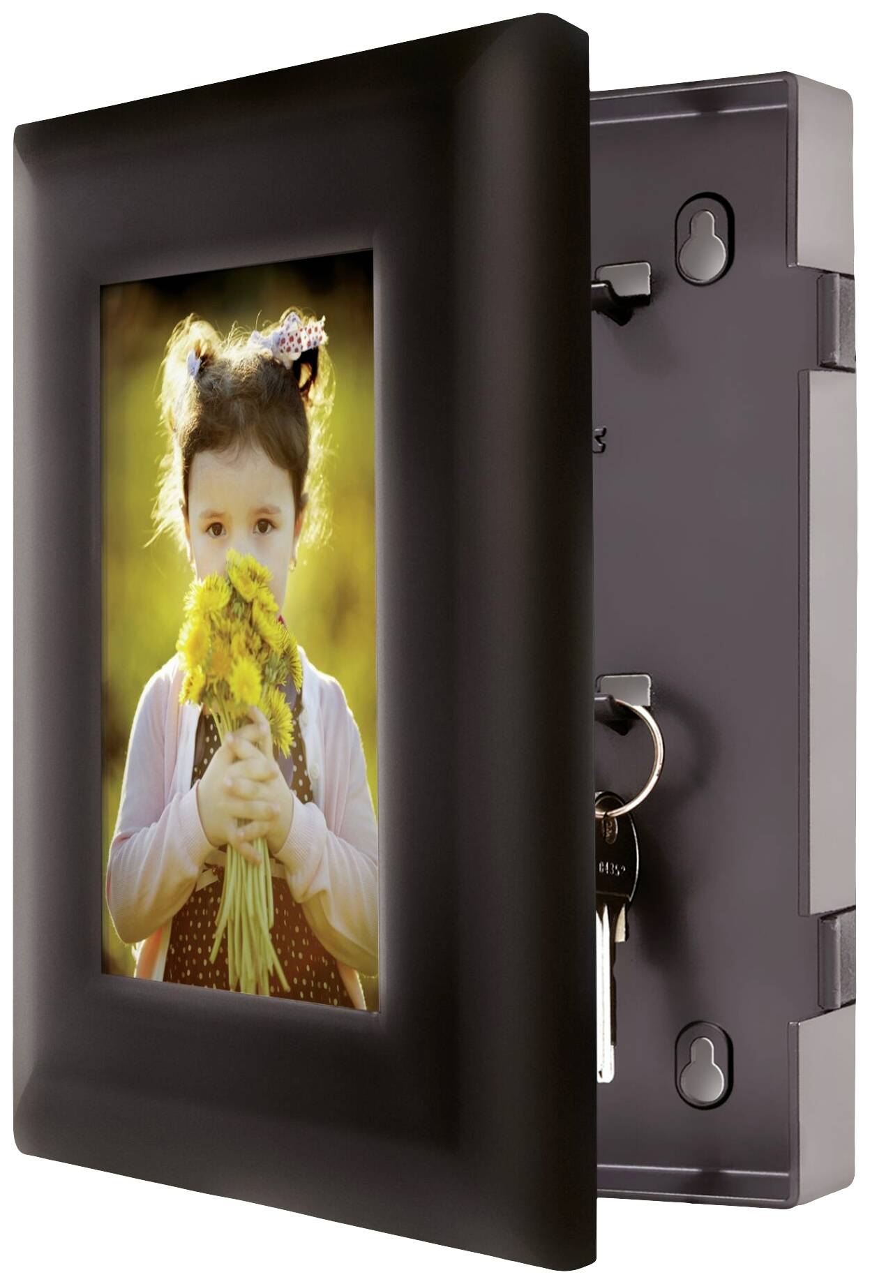 A girl is holding a bunch of yellow flowers and standing in front of a black picture frame that serves as a key box.