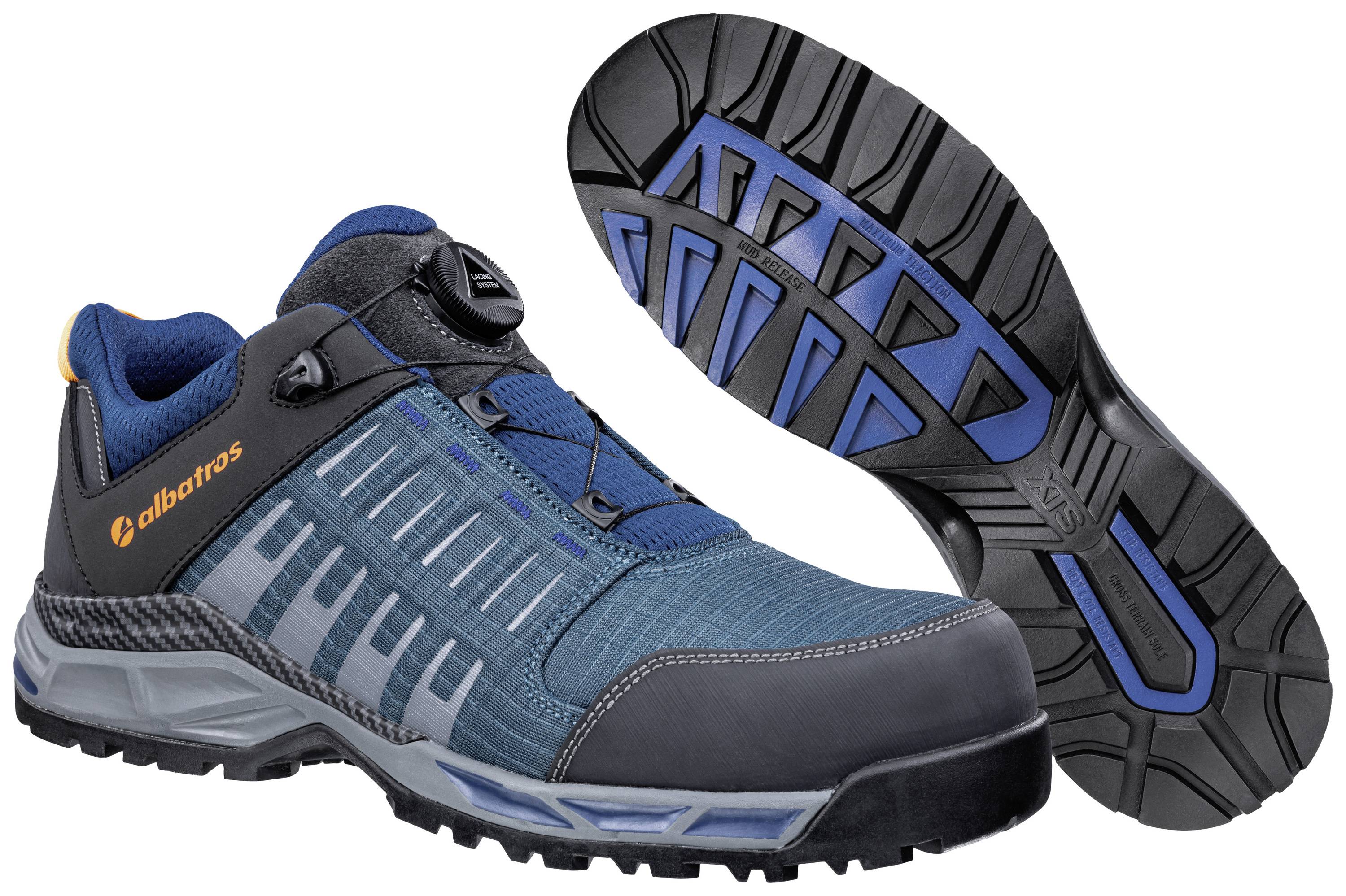 A pair of navy-black sports trainers, shown from the side and underneath. They feature a modern design with a robust sole.