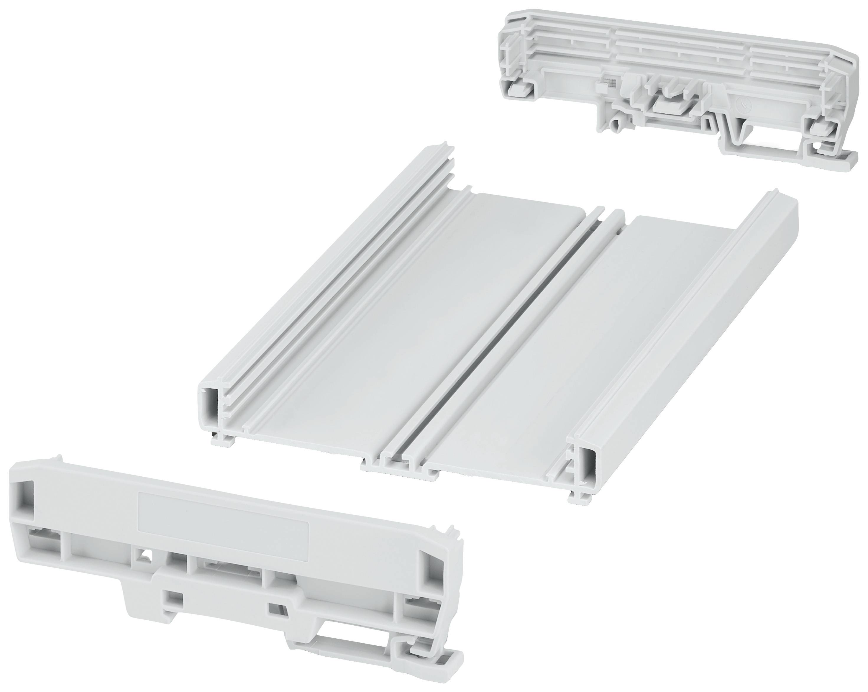 A grey plastic housing component, consisting of a flat base and two removable side panels, rests on a white surface.