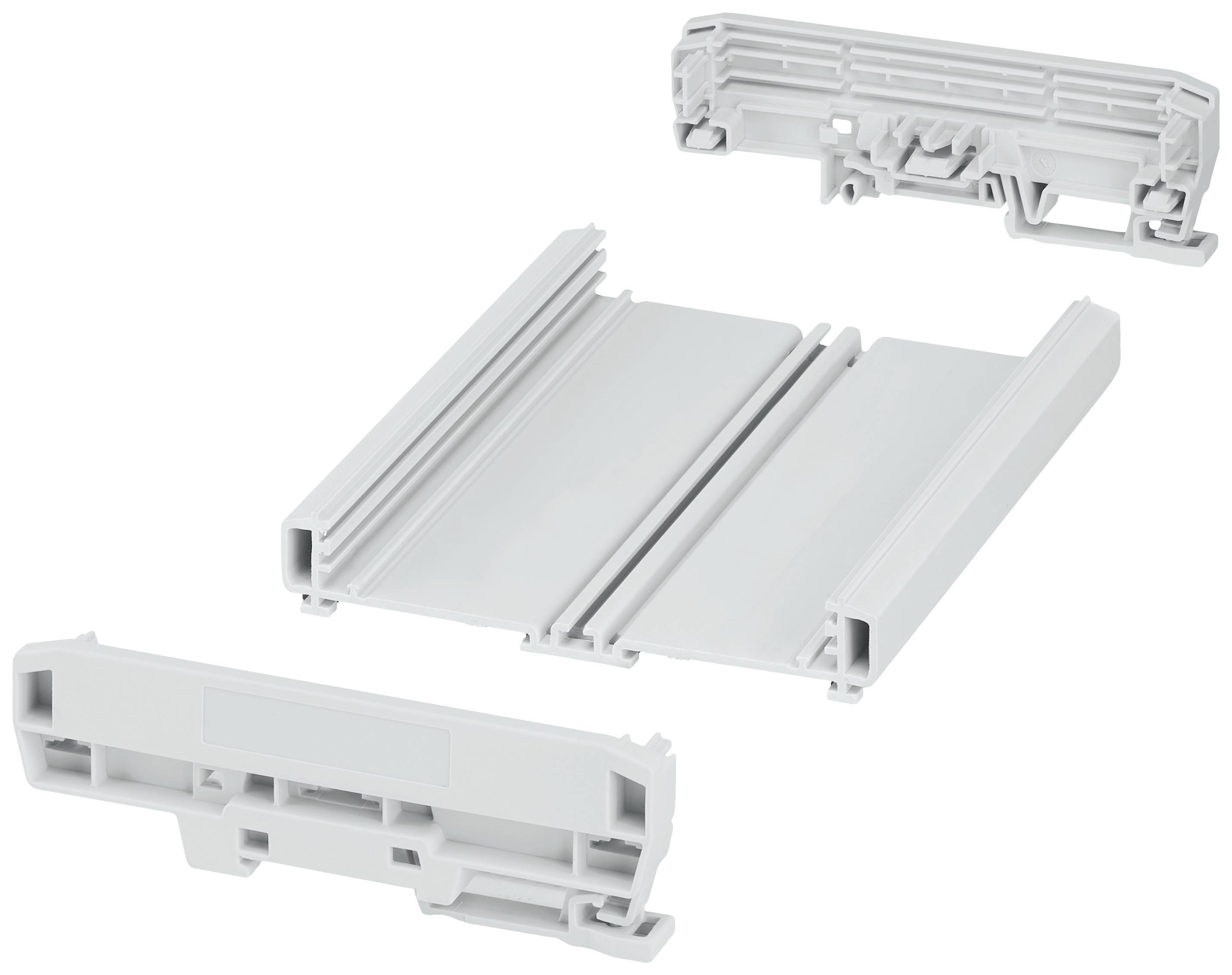 Three grey, rectangular plastic components in different shapes, possibly for assembling a housing or frame.