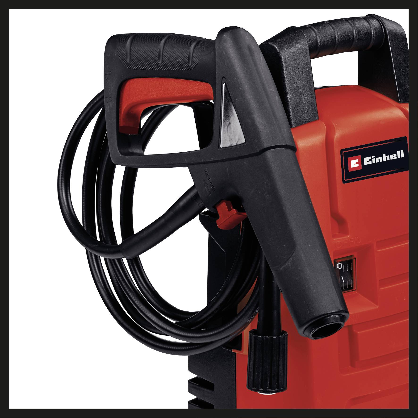Einhell high-pressure washer with hose and handle. Predominantly in red.