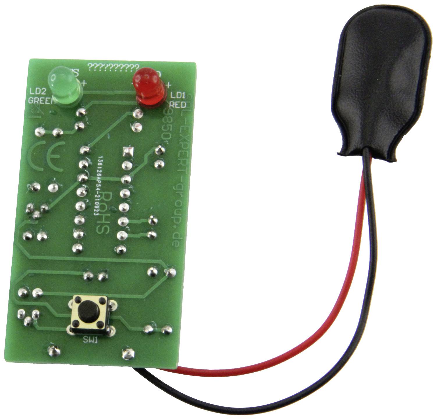 Electronic circuit board with a red and a green LED, connected to a black, rectangular component and wires.