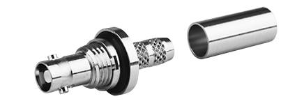 Close-up of a metal connector with threading, sealing ring, and mesh-like grip.