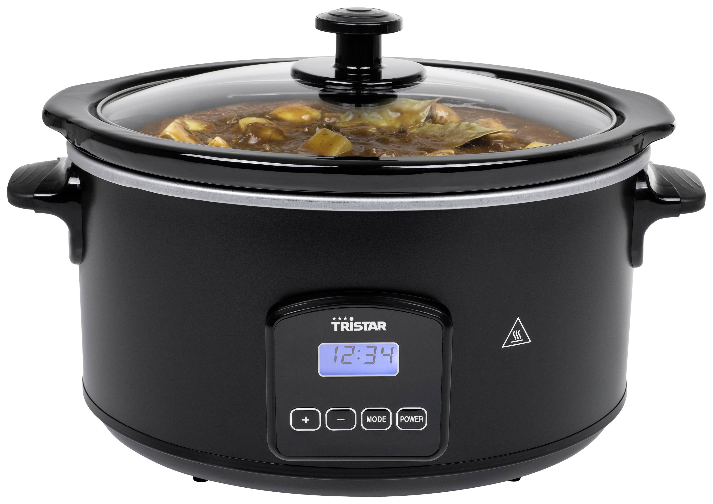A black slow cooker with a digital display shows '12:34'. Inside, a stew with vegetables and meat is visible.