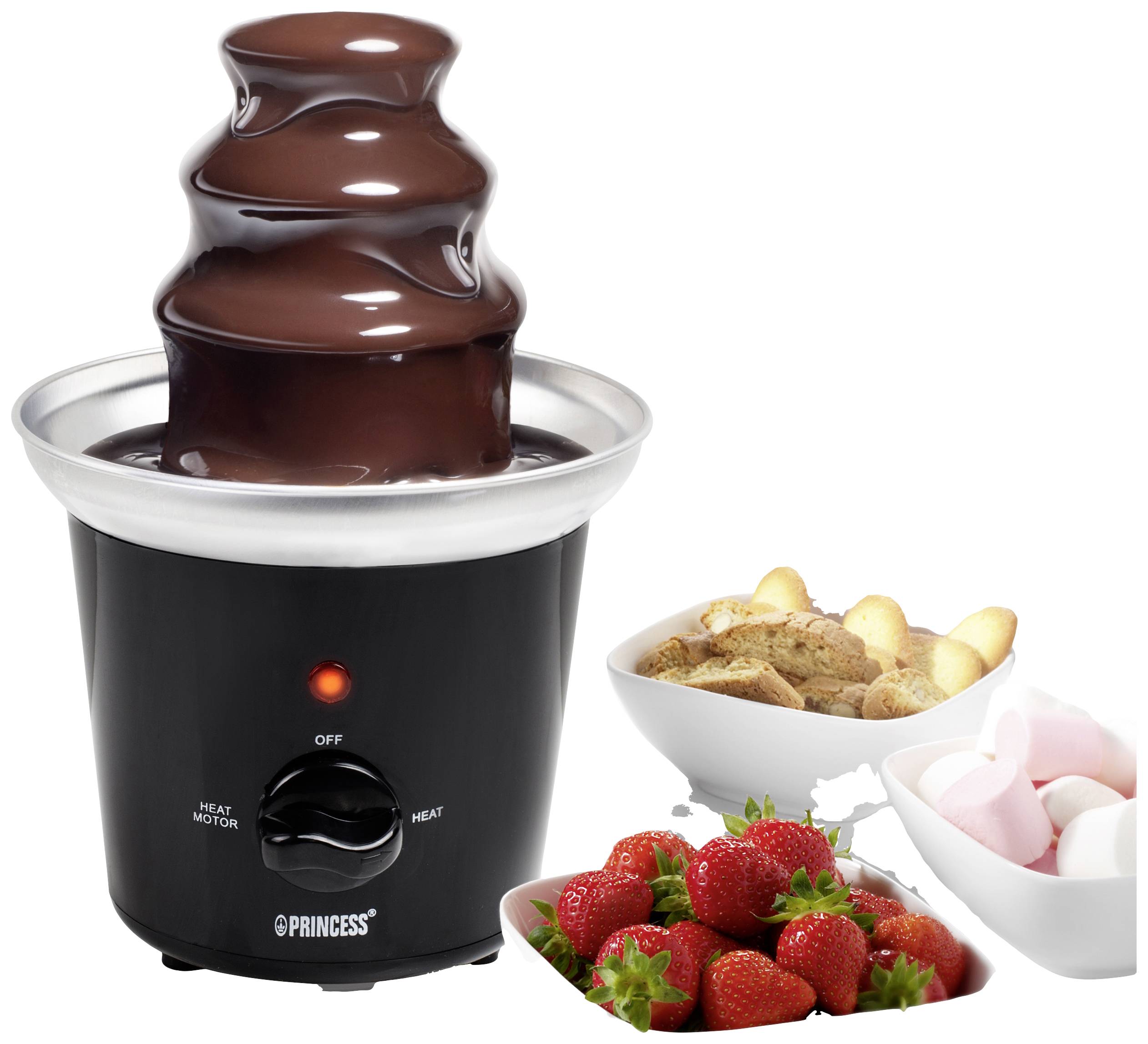 A chocolate fountain, surrounded by bowls of strawberries, biscuits, and marshmallows, invites you to dip in.