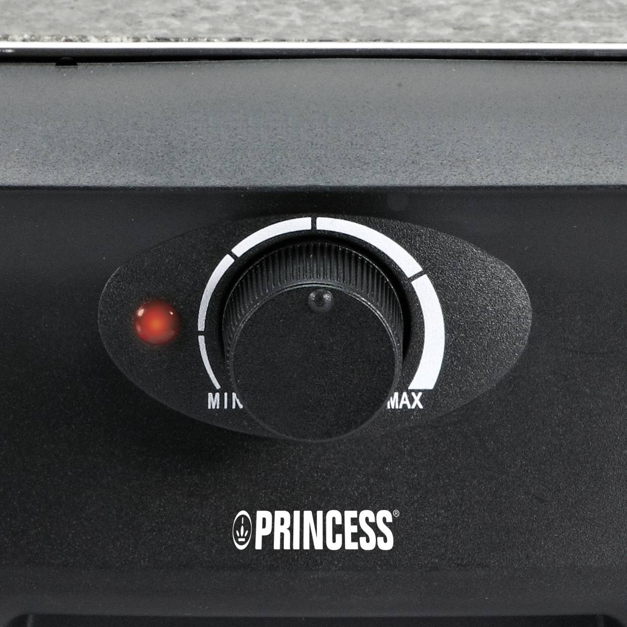 Rotary control knob of a 'Princess' kitchen appliance, with a scale ranging from Min to Max and a red indicator light.