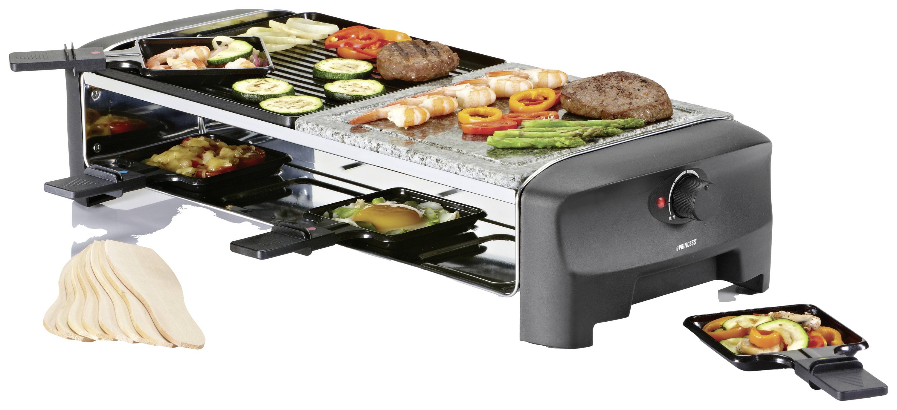 An electric table grill with a raclette function displays grilled vegetables, meat and seafood on the grill plate, with small pans filled underneath.