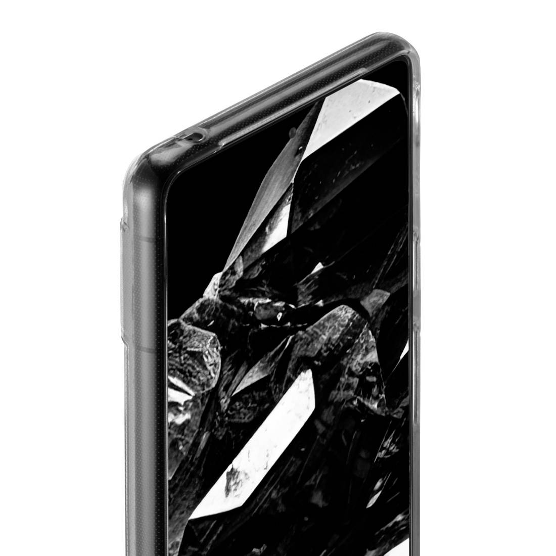 Smartphone with a black geometric pattern on the screen, side view.
