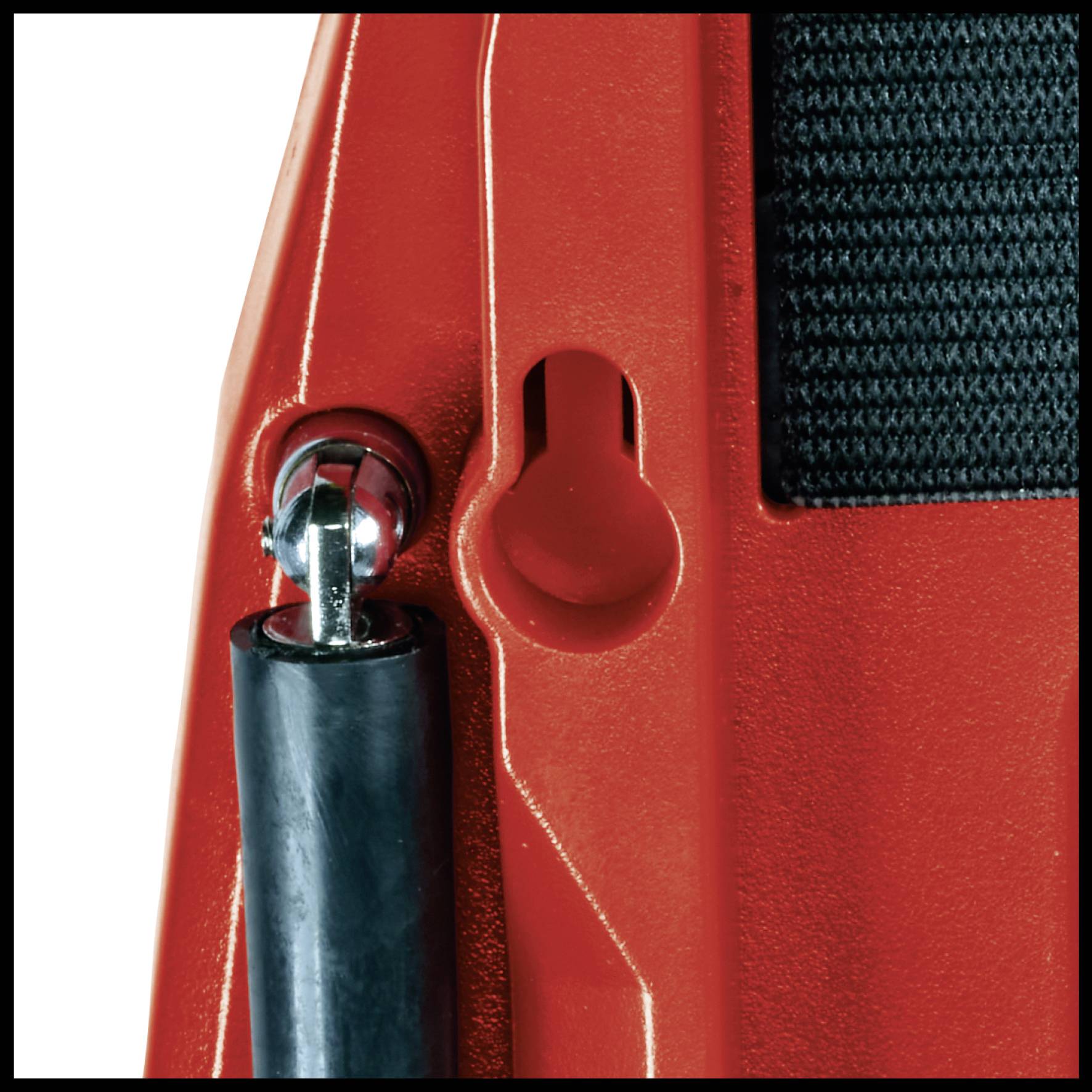 Close-up view of a metallic red tool with a black handle, shown in a detailed perspective.