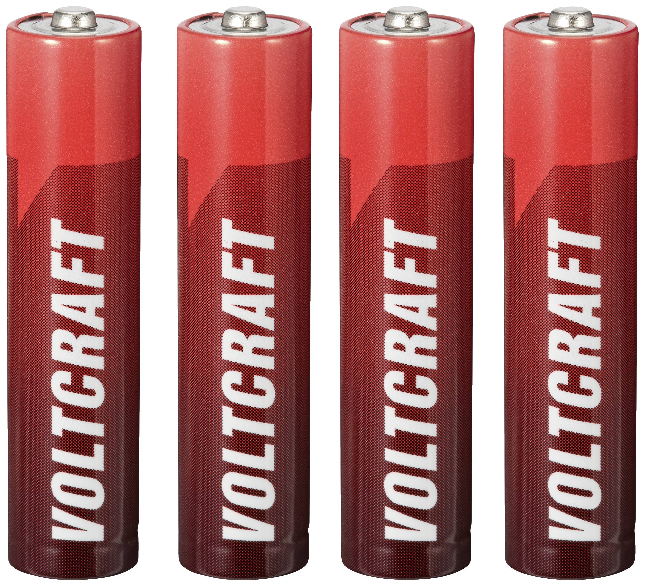 Four red AA batteries from the Voltcraft brand are lined up side by side.