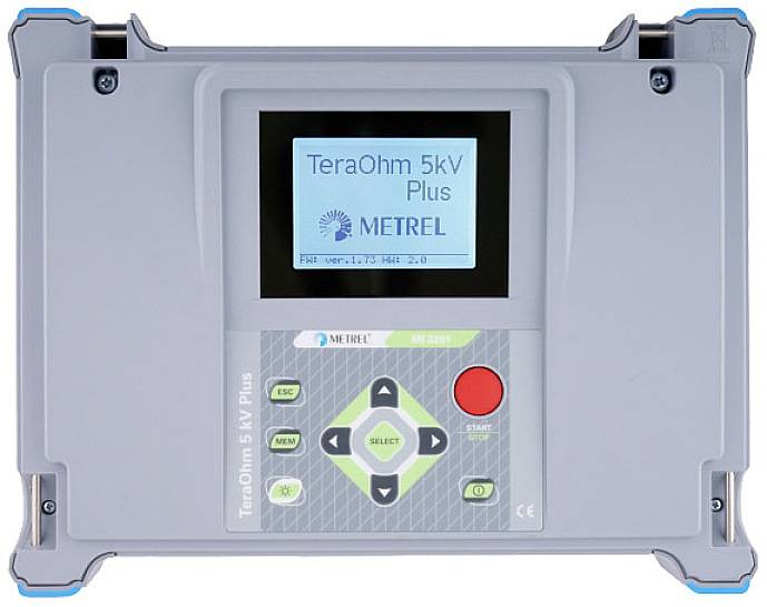 Electrical testing device with digital display, showing the text 'TeraOhm 5kV Plus' and 'METREL', grey casing, with red and green buttons.