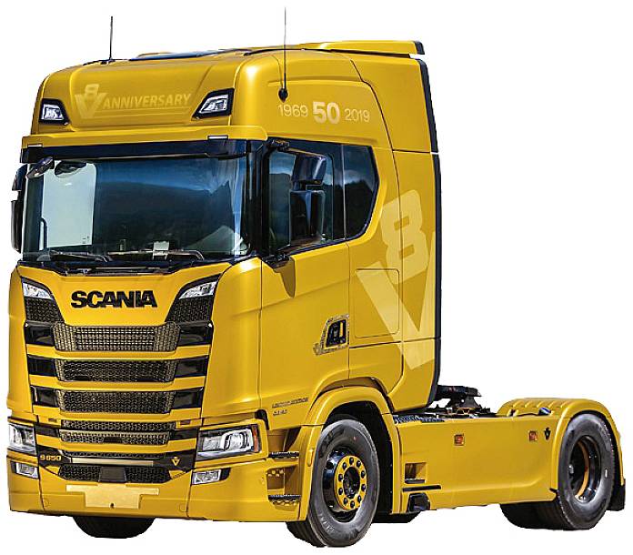 Yellow Scania lorry from 1969, with anniversary lettering '50 Years'. No trailer, driver or surroundings visible.