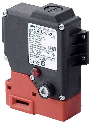 Industrial safety door lock switch with red and black housing and label on front.