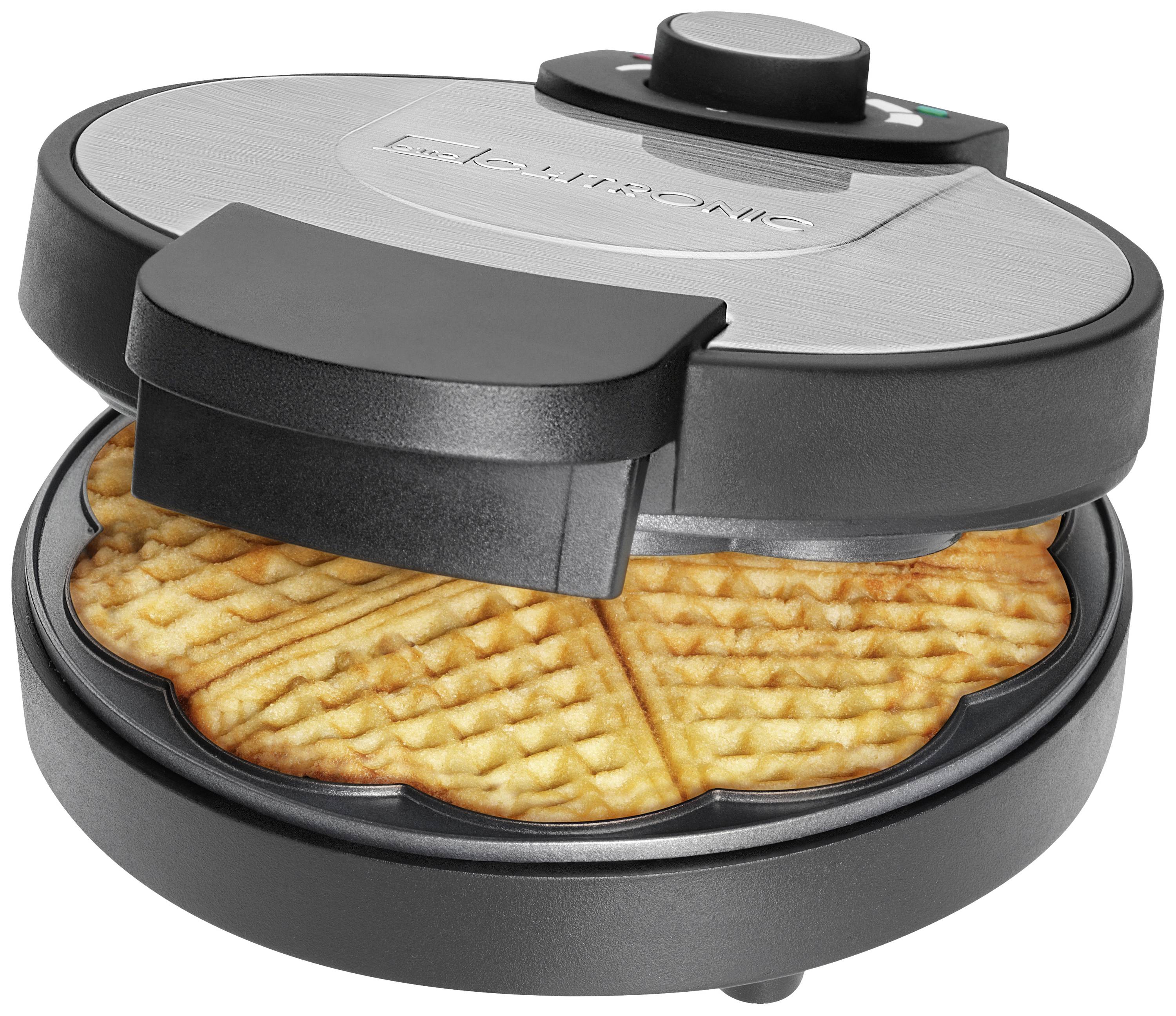 A waffle iron showing a freshly baked waffle.