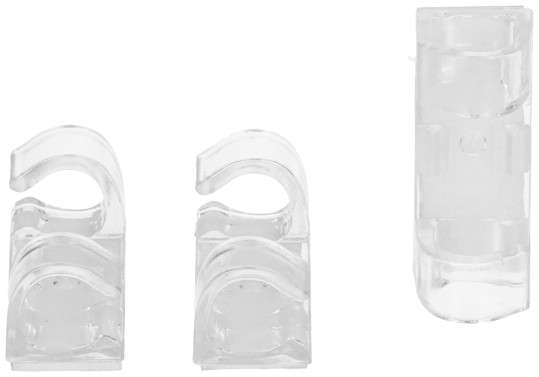 Three transparent plastic clips, two hook-shaped and one cylindrical. They are used for fastening or organisation.