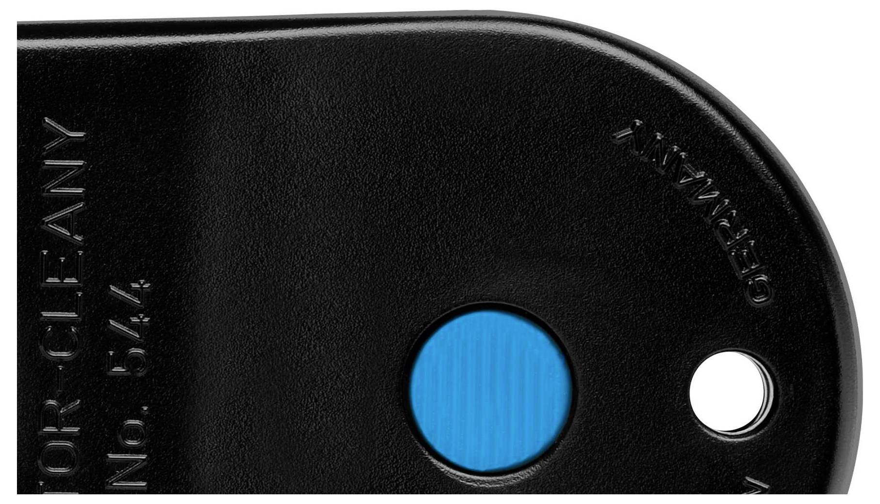 Black object with a blue dot and small round opening, with 'GERMANY' engraved on the surface.