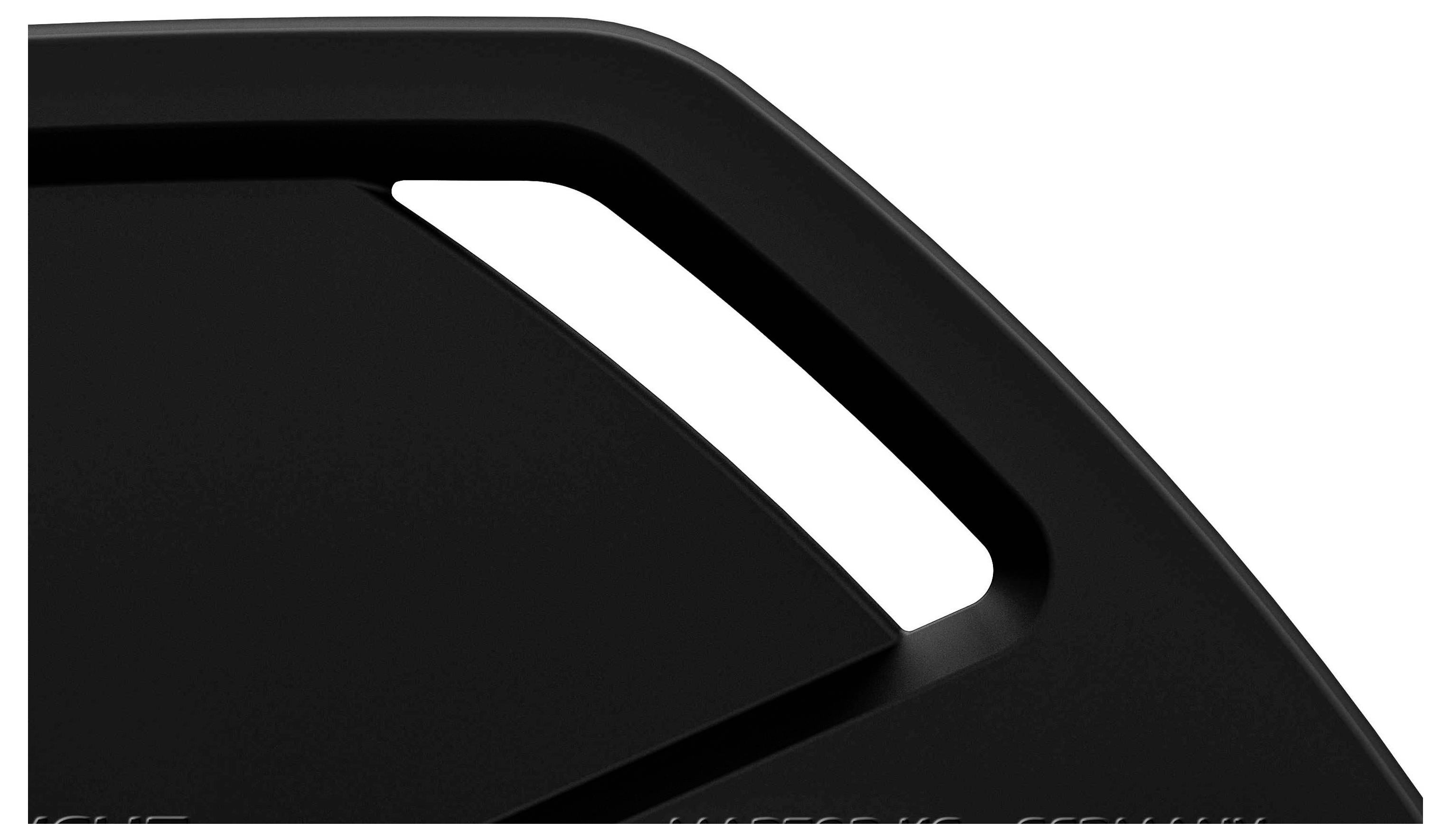 Black, angular object with a thin, triangular aperture; possibly part of a larger, modern design.