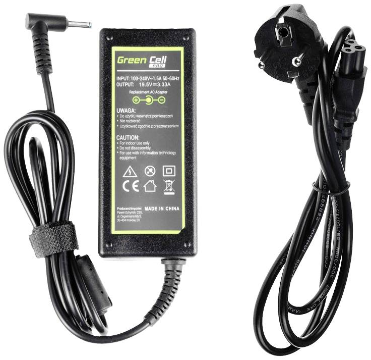 Laptop power supply with black cable and European plug type. Sticker with technical specifications and warning notices visible.