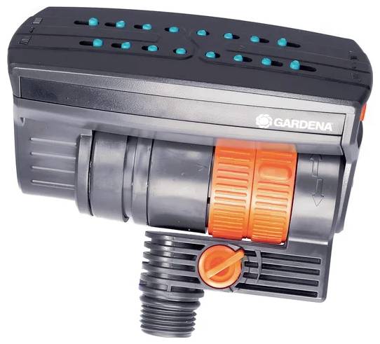 A Gardena irrigation sprinkler in black and orange, with red and blue accents, for garden irrigation systems.