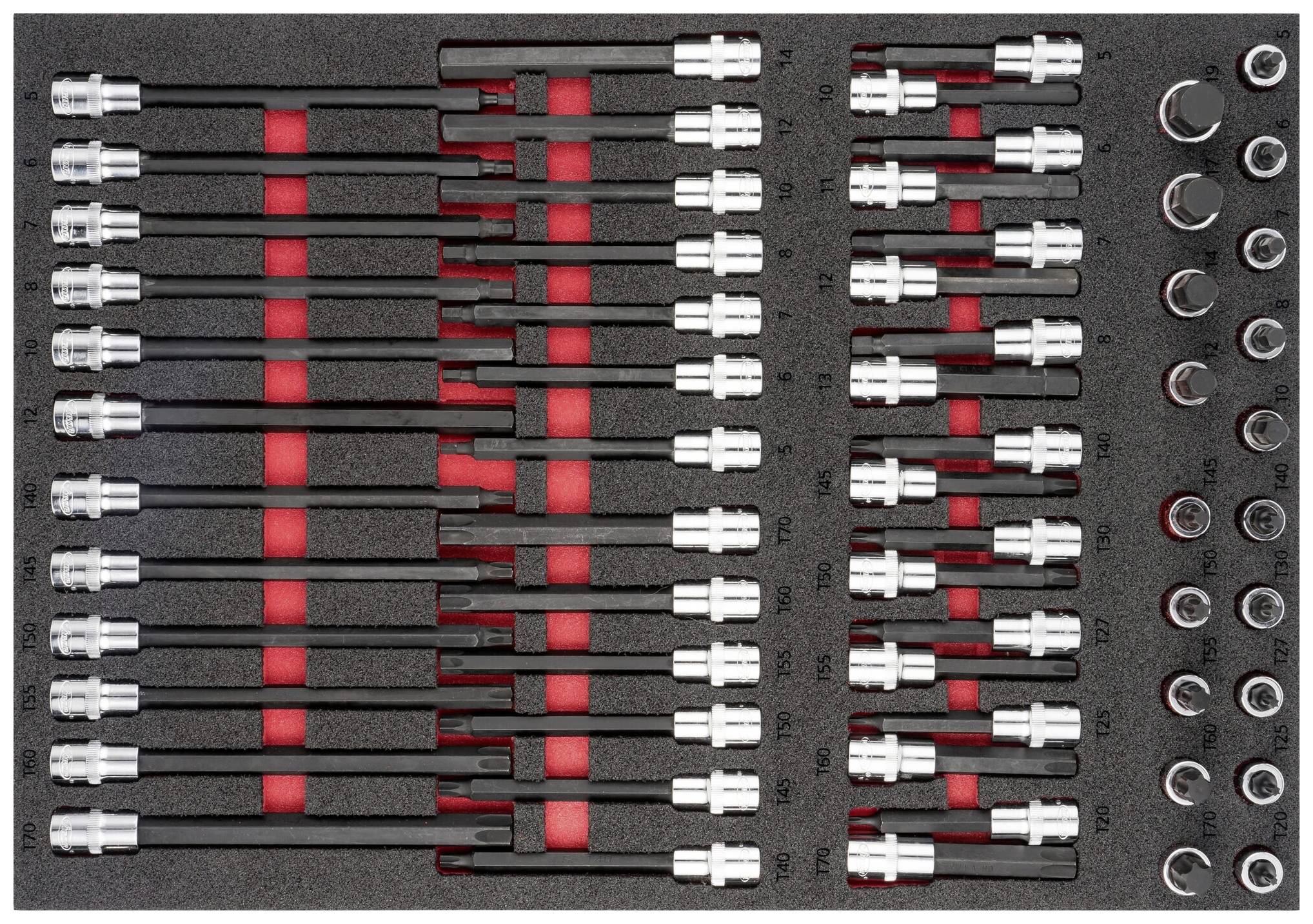 A set of socket wrenches and extensions in a foam insert.