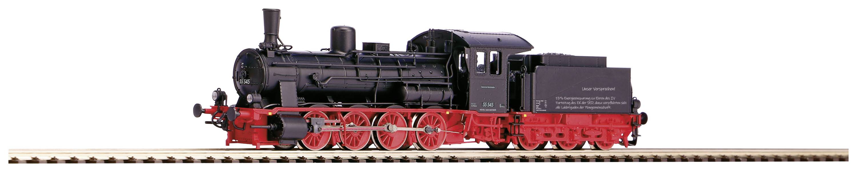 Historic steam locomotive on a track, black with a red chassis, viewed from the side.