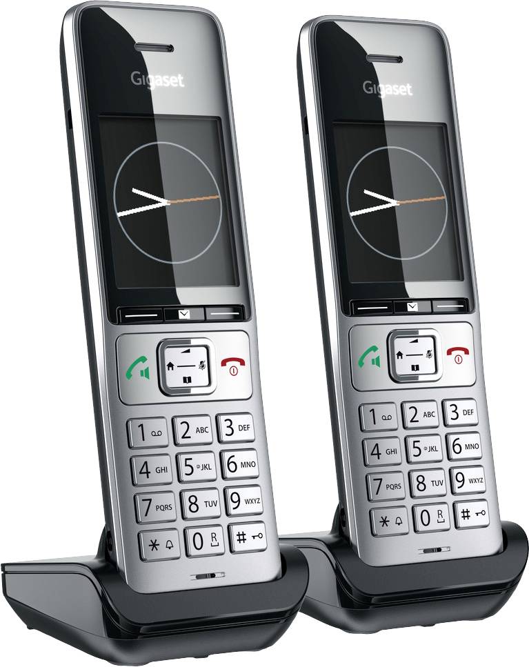 Two cordless telephones stand side by side on their charging stations. They have a modern design and large buttons.