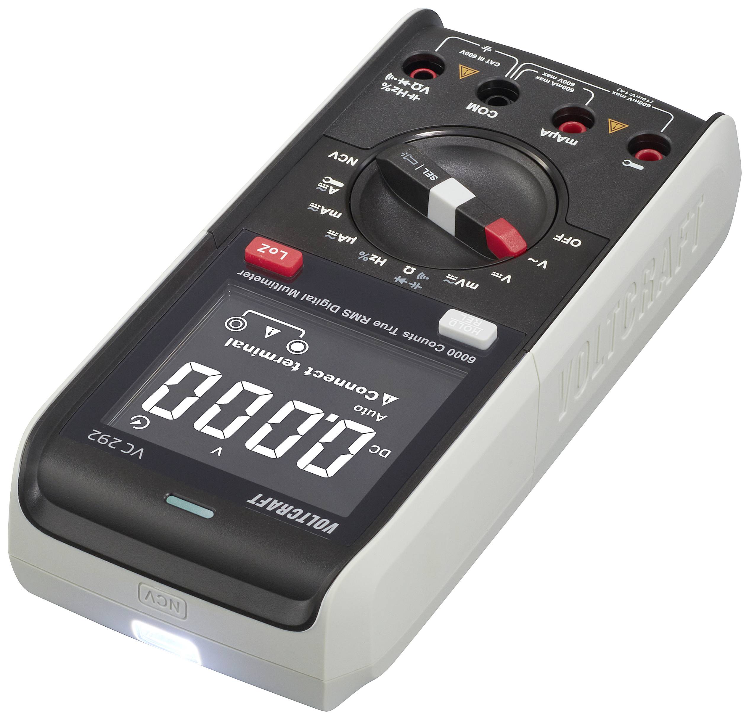 Digital multimeter with a large display, multiple measurement functions, rotary switch set to DC Volt, red and black measurement connection sockets at the top.
