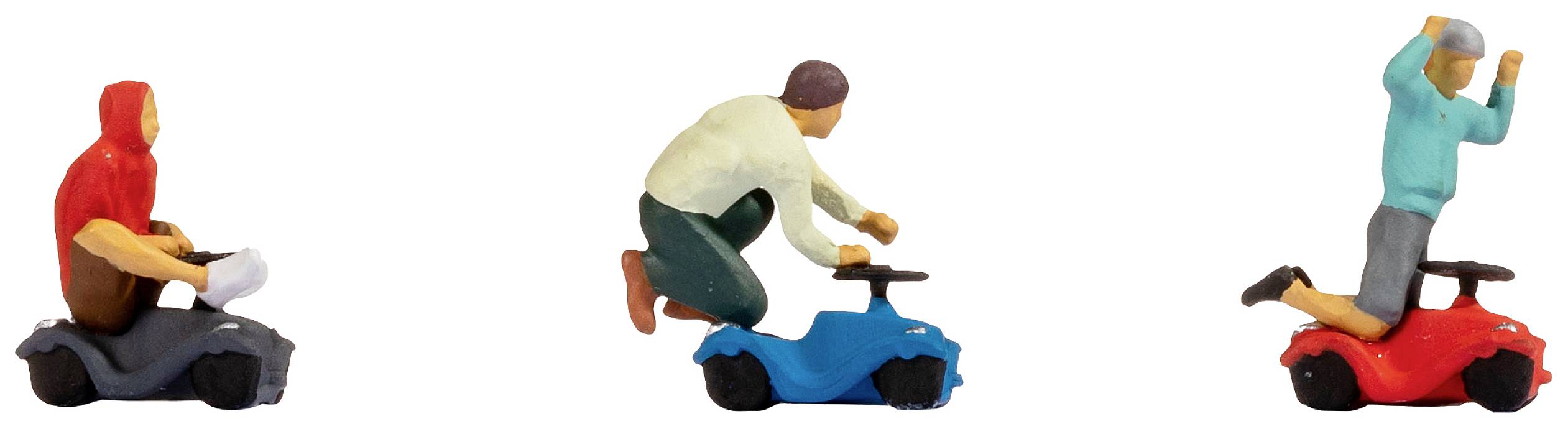 Three small figures on vehicle seats: on the left wearing a red helmet, in the middle leaning forward, on the right jumping on a red vehicle.