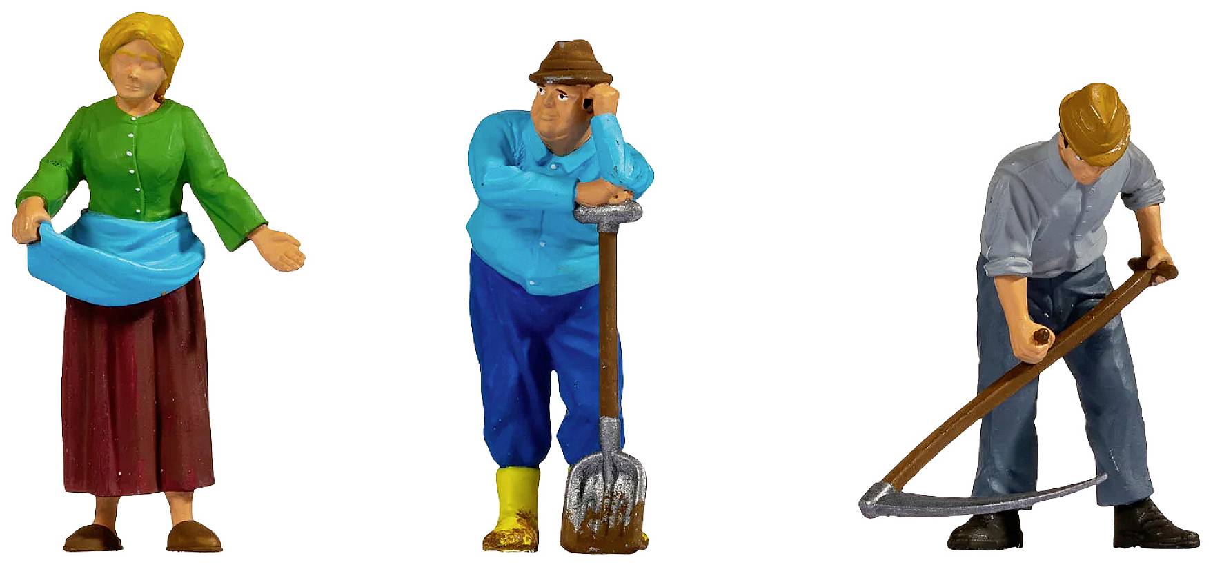 Three miniature figurines: A woman in traditional clothing, a man with a spade, and another man using a scythe.
