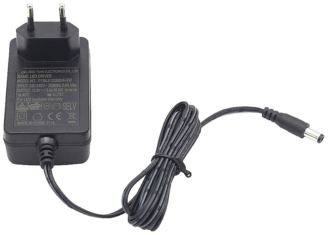 Black power adapter with European plug and cable. Text on the power adapter shows specifications such as model number and input voltage.