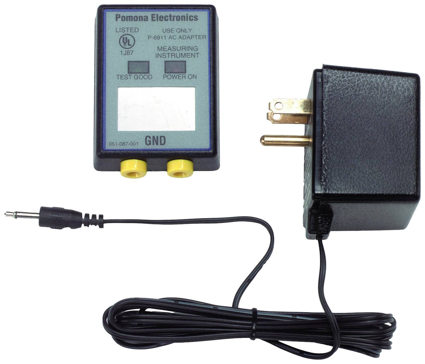 An electrical measuring device with power cable and mains plug. The device has two yellow connectors and a display panel with writing.