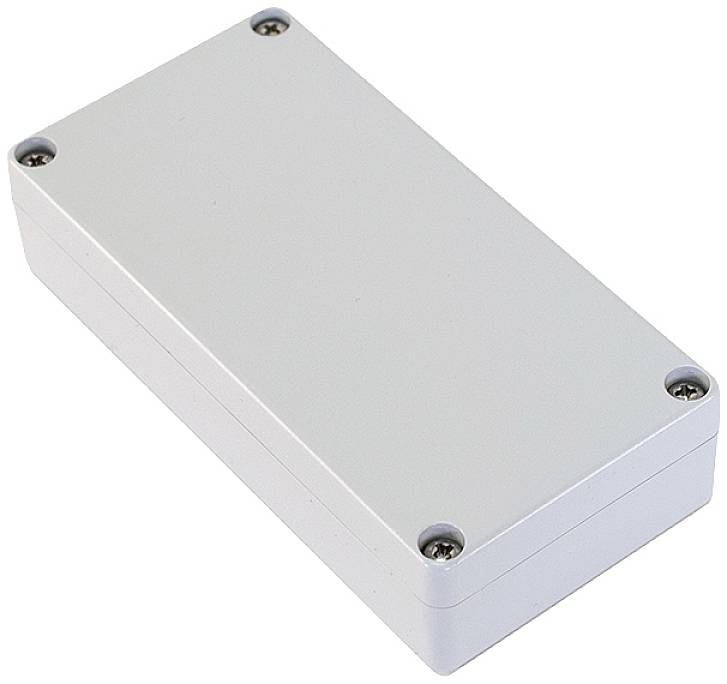 Rectangular, grey, closed plastic box with four screws at the corners.