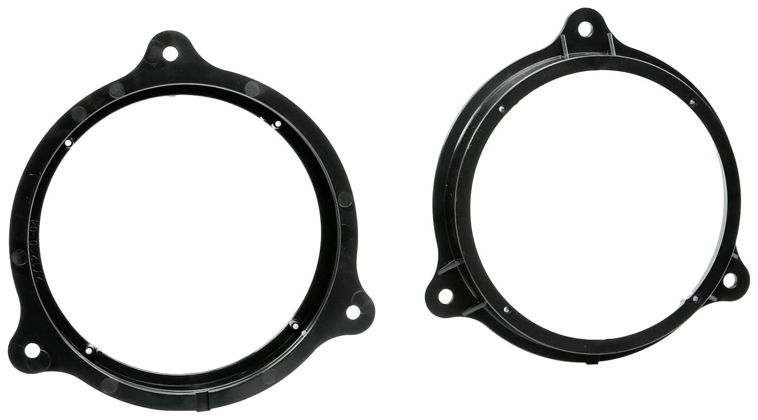 Two black, round plastic adaptor rings with holes for mounting, differing in design, likely for speakers.