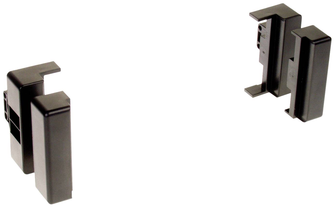 Two black plastic forms that mirror each other, presumably parts of a mounting or fastening system.