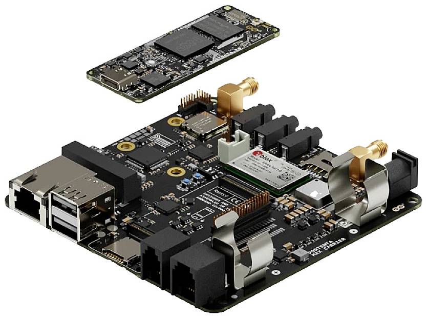 A microcontroller board with multiple USB ports, Ethernet connections, and an attached module. It displays complex circuitry.