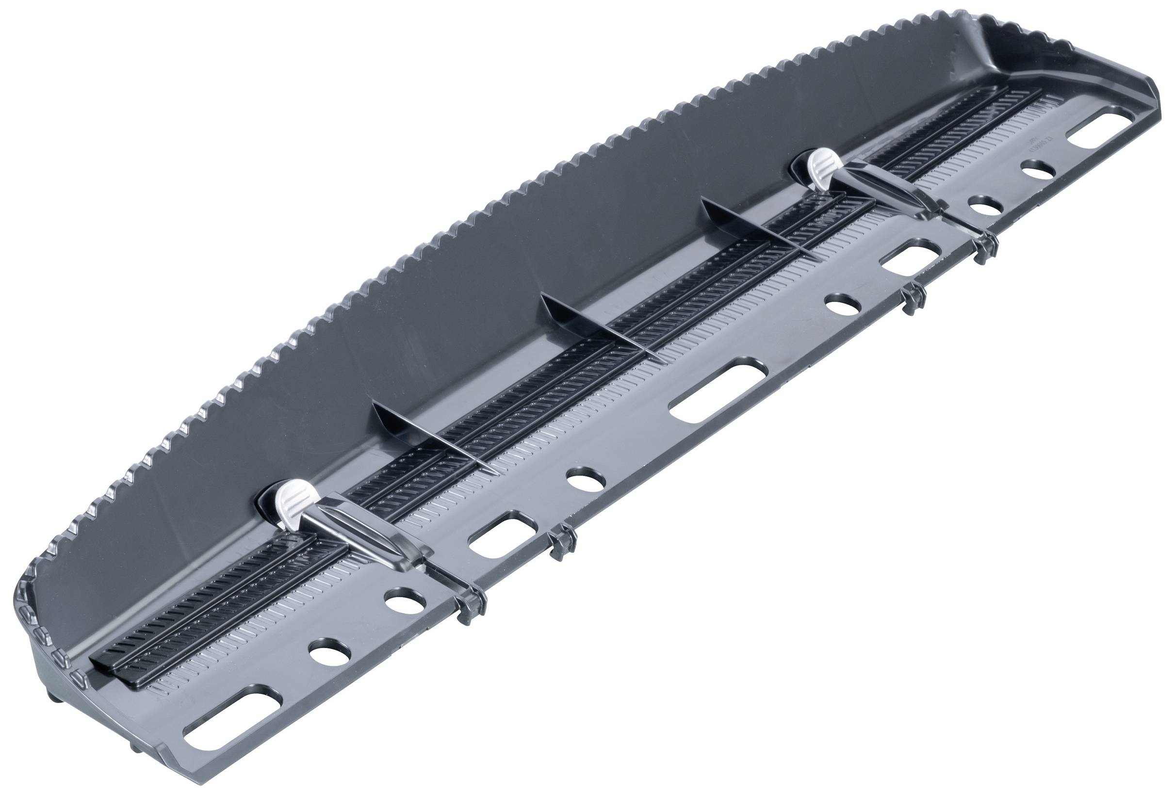 A grey plastic component with multiple recesses and two clips, potentially part of a mounting bracket or device.