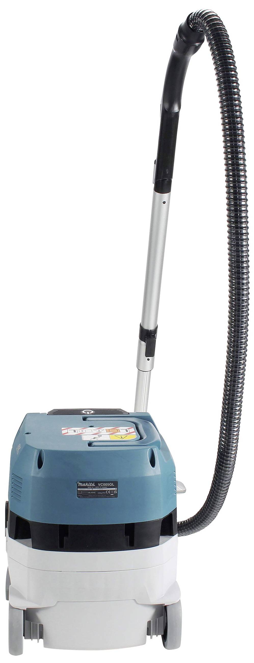 An industrial vacuum cleaner with a long hose, suitable for heavy-duty cleaning work, stands upright on the floor.
