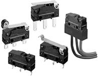 Five different microswitches in various designs and switching mechanisms, depicted on a white background.